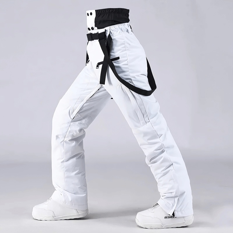 Unisex windproof warm ski trousers with suspenders, adjustable fit, cotton and polyester blend, ideal for skiing and snowboarding.